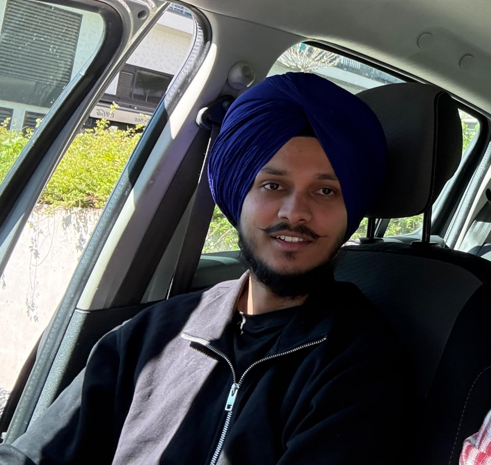 Photo of Parminder, a successful client.